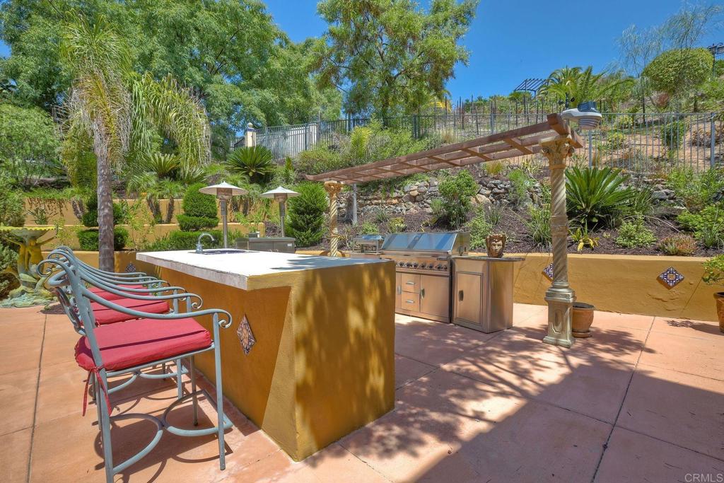 17284 Reflections Circle San Diego, CA 92127 - Photo 13 of 53 a view of a swimming pool with a patio