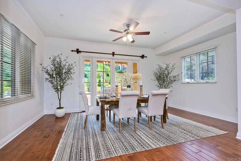 17284 Reflections Circle San Diego, CA 92127 - Photo 20 of 53 a view of a dining room with furniture window and wooden floor