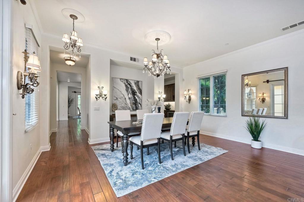 17284 Reflections Circle San Diego, CA 92127 - Photo 29 of 53 a view of a dining room with furniture window and wooden floor