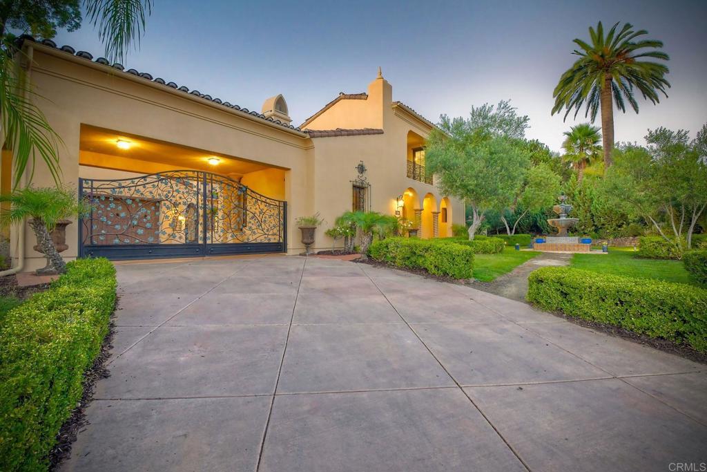 17284 Reflections Circle San Diego, CA 92127 - Photo 3 of 53 a view of a house with a yard and potted plants