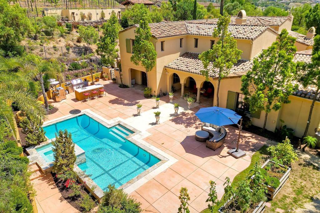 17284 Reflections Circle San Diego, CA 92127 - Photo 47 of 53 a view of a chairs and table in the patio
