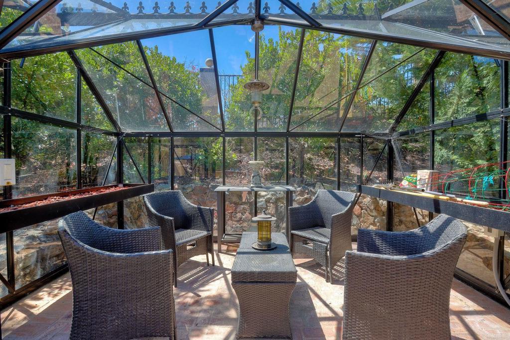 17284 Reflections Circle San Diego, CA 92127 - Photo 48 of 53 a view of a patio with couches chairs and potted plants