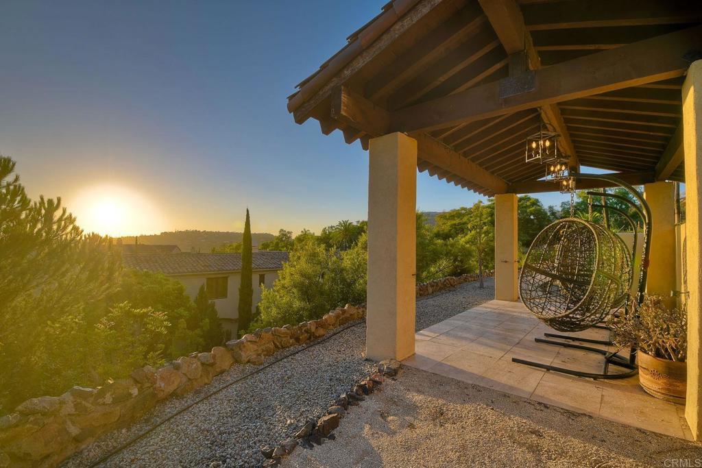17284 Reflections Circle San Diego, CA 92127 - Photo 49 of 53 a view of a patio with a table and chairs
