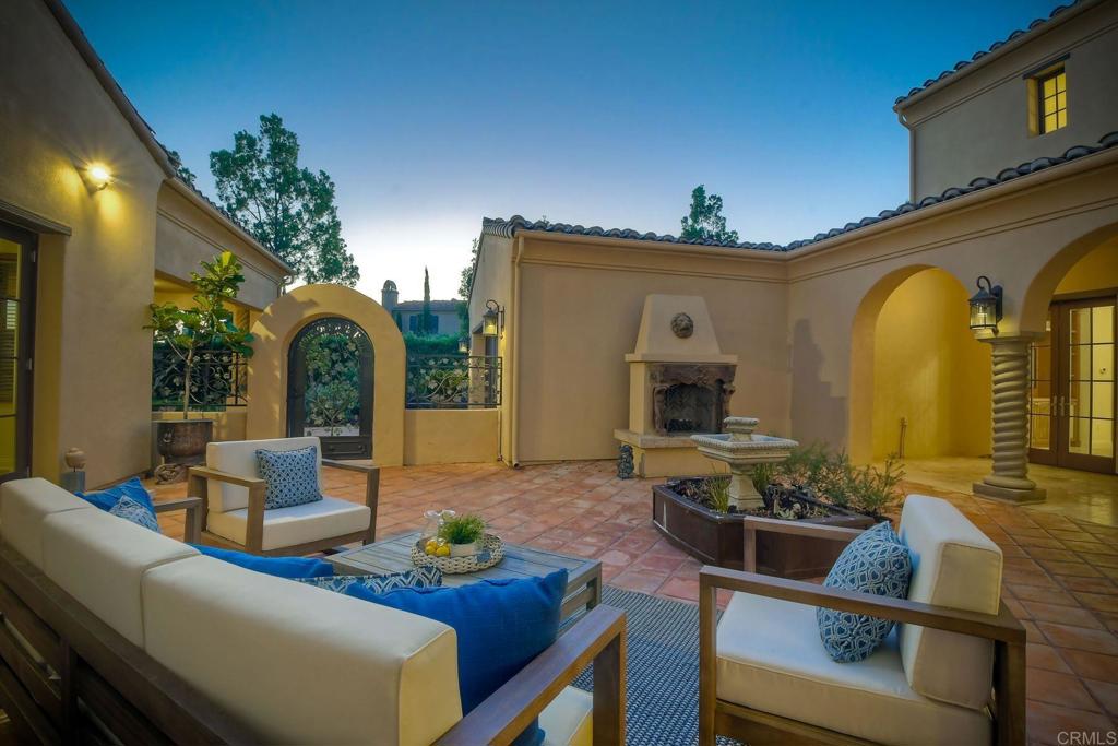 17284 Reflections Circle San Diego, CA 92127 - Photo 8 of 53 a view of a patio with couches chairs and a potted plant