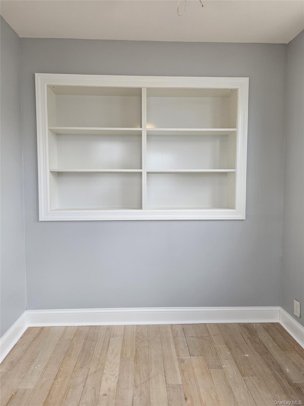 30-32 84th Street Queens, NY 11370 - Photo 17 of 37 a view of a room with shelf