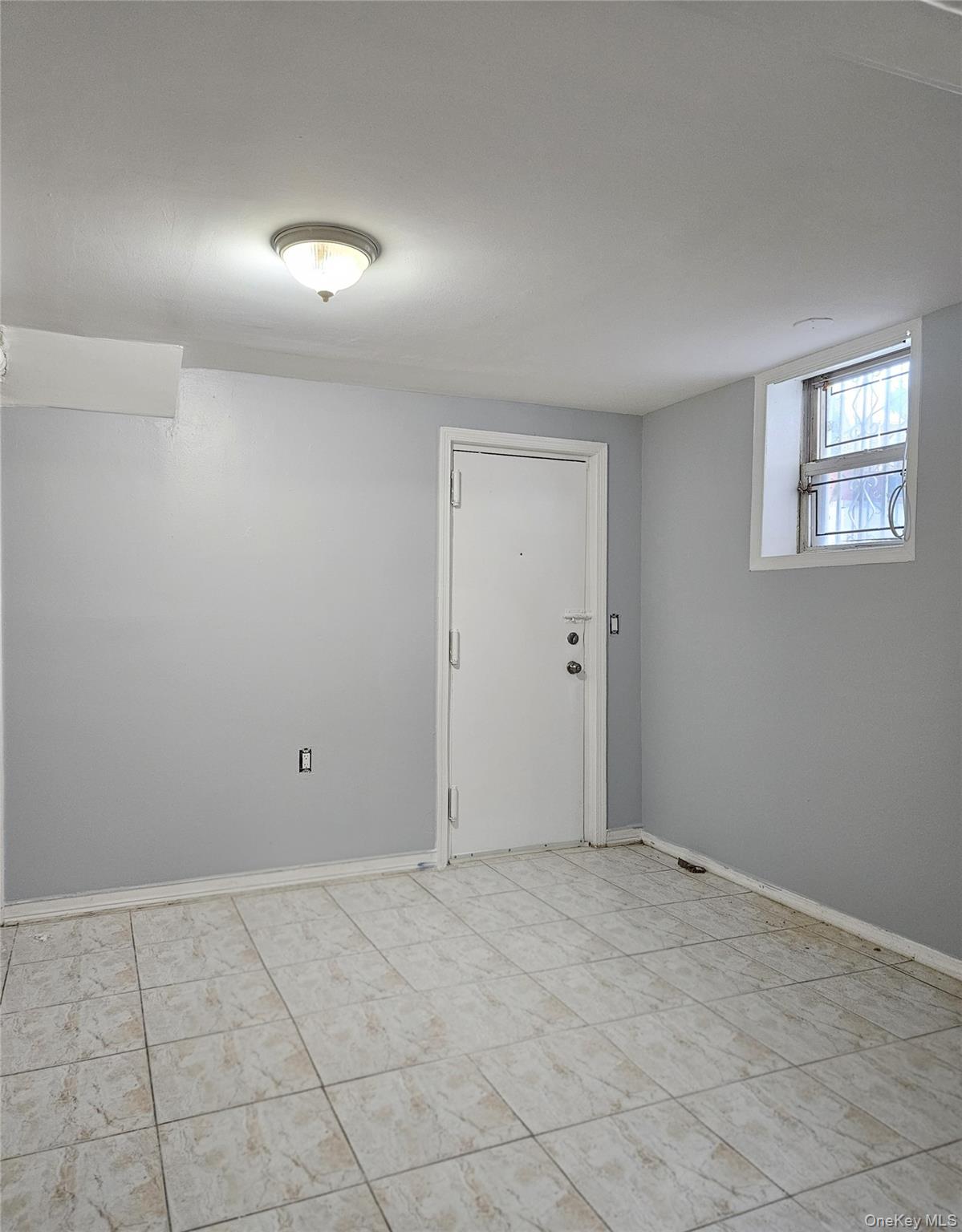 30-32 84th Street Queens, NY 11370 - Photo 36 of 37 a view of an empty room and window