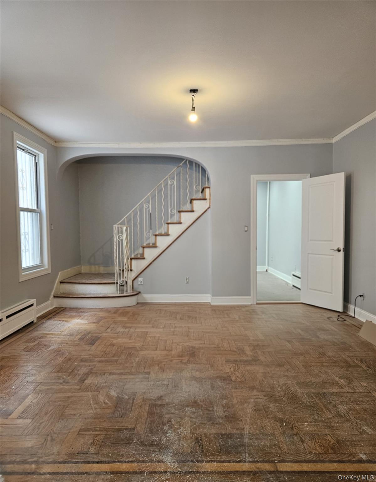 30-32 84th Street Queens, NY 11370 - Photo 6 of 37 a view of an empty room with stairs