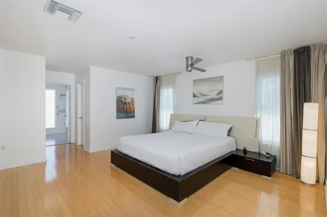 a bathroom with a toilet a sink and shower