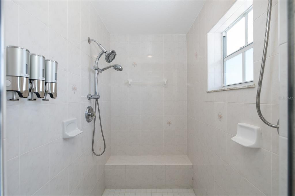 8401 Carolyn Drive Port Richey, FL 34668 - Photo 32 of 66 a bathroom with a shower