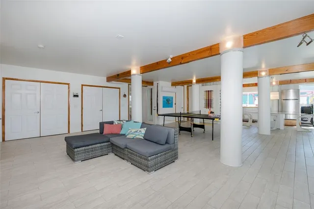 a view of a balcony with chairs