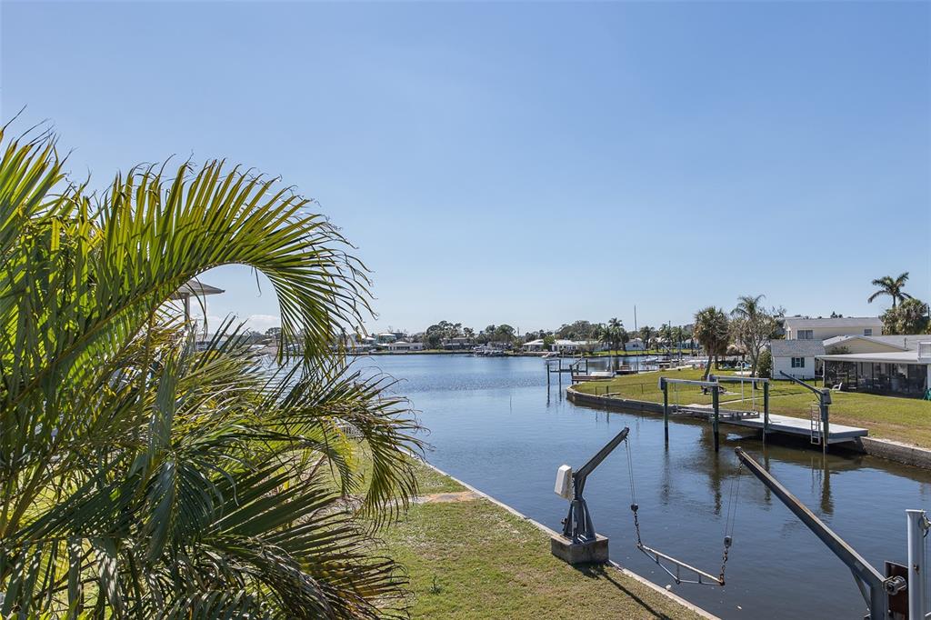 8401 Carolyn Drive Port Richey, FL 34668 - Photo 51 of 66 a view of a swimming pool with a seating space