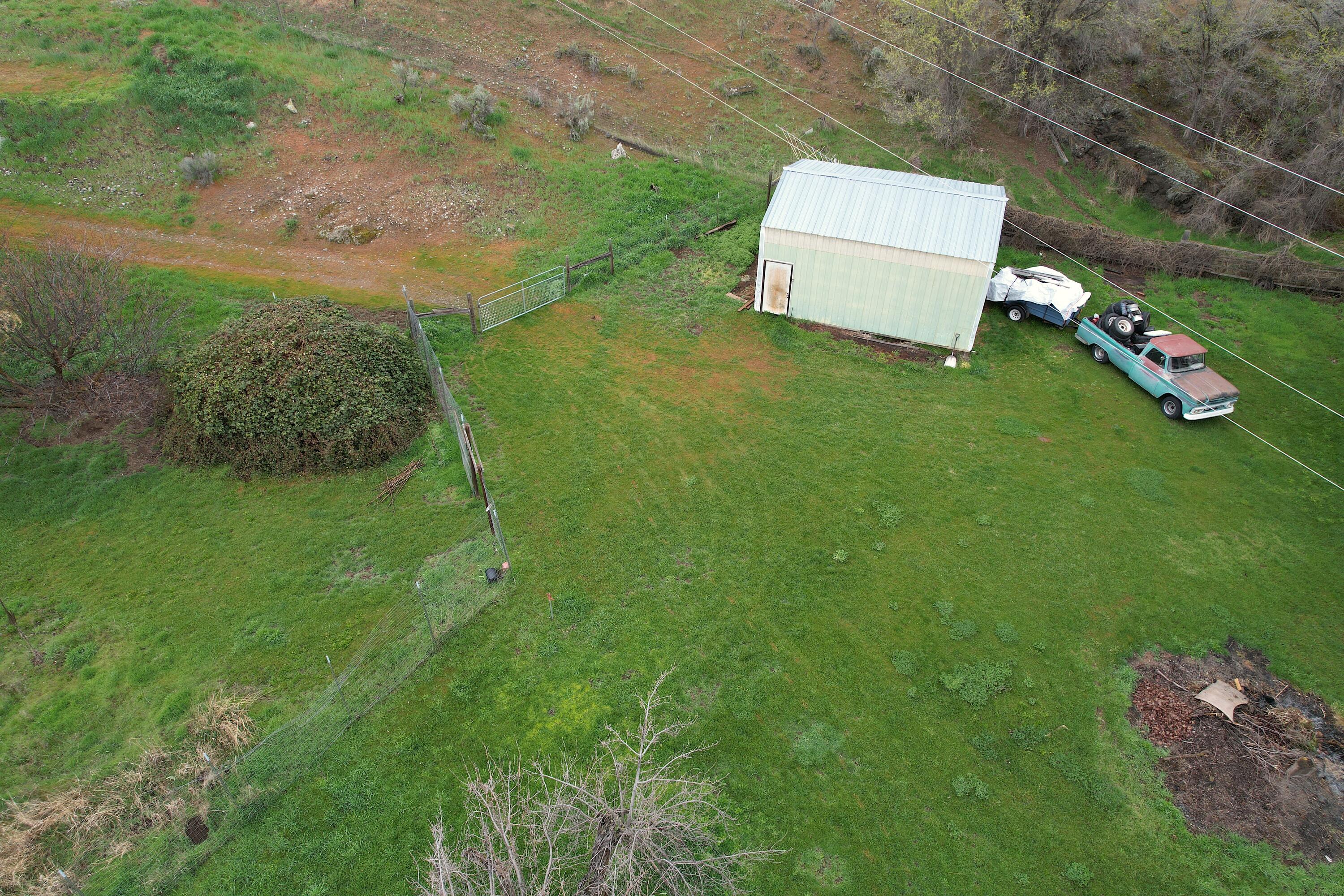 298 Main Street Monument, OR 97864 - Photo 57 of 66 an aerial view of a house with a yard