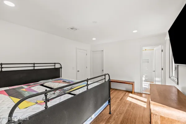 an aerial view of a house with a garden and swimming pool