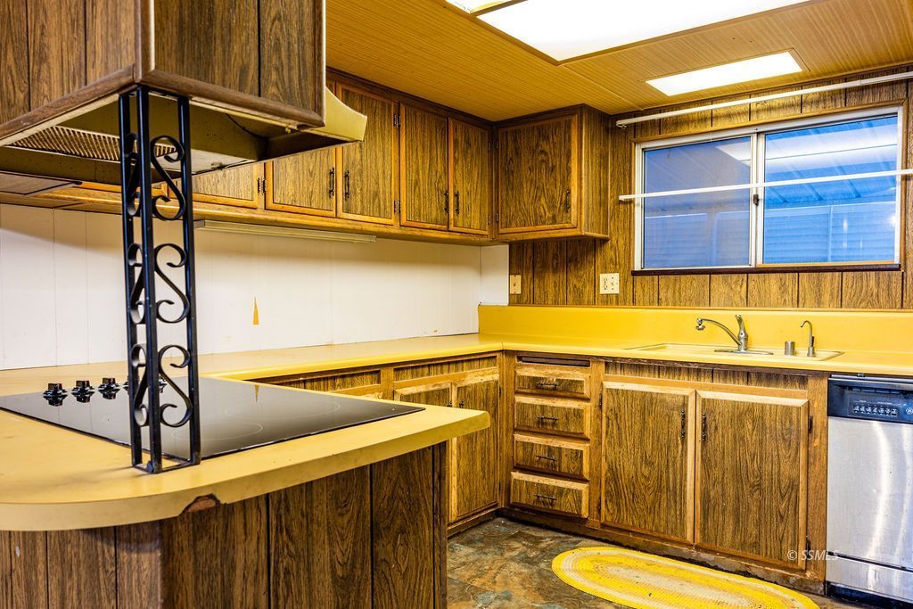 5234 Cholla Way Ridgecrest, CA 93555 - Photo 15 of 39 a view of a kitchen with a sink and cabinets