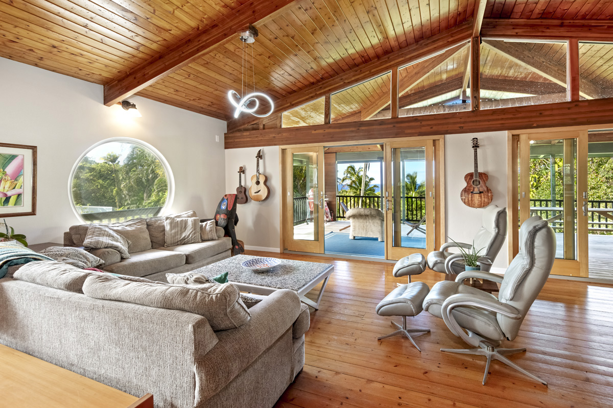15-2817 Papai Street Pahoa, HI 96778 - Photo 12 of 30 a living room with furniture and a large window