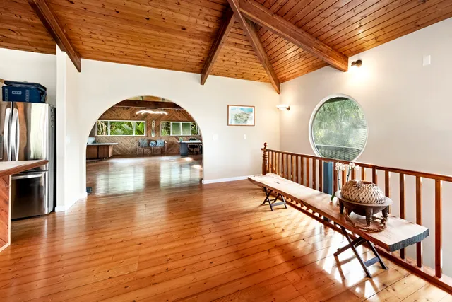 a view of living room with furniture and floor to ceiling window