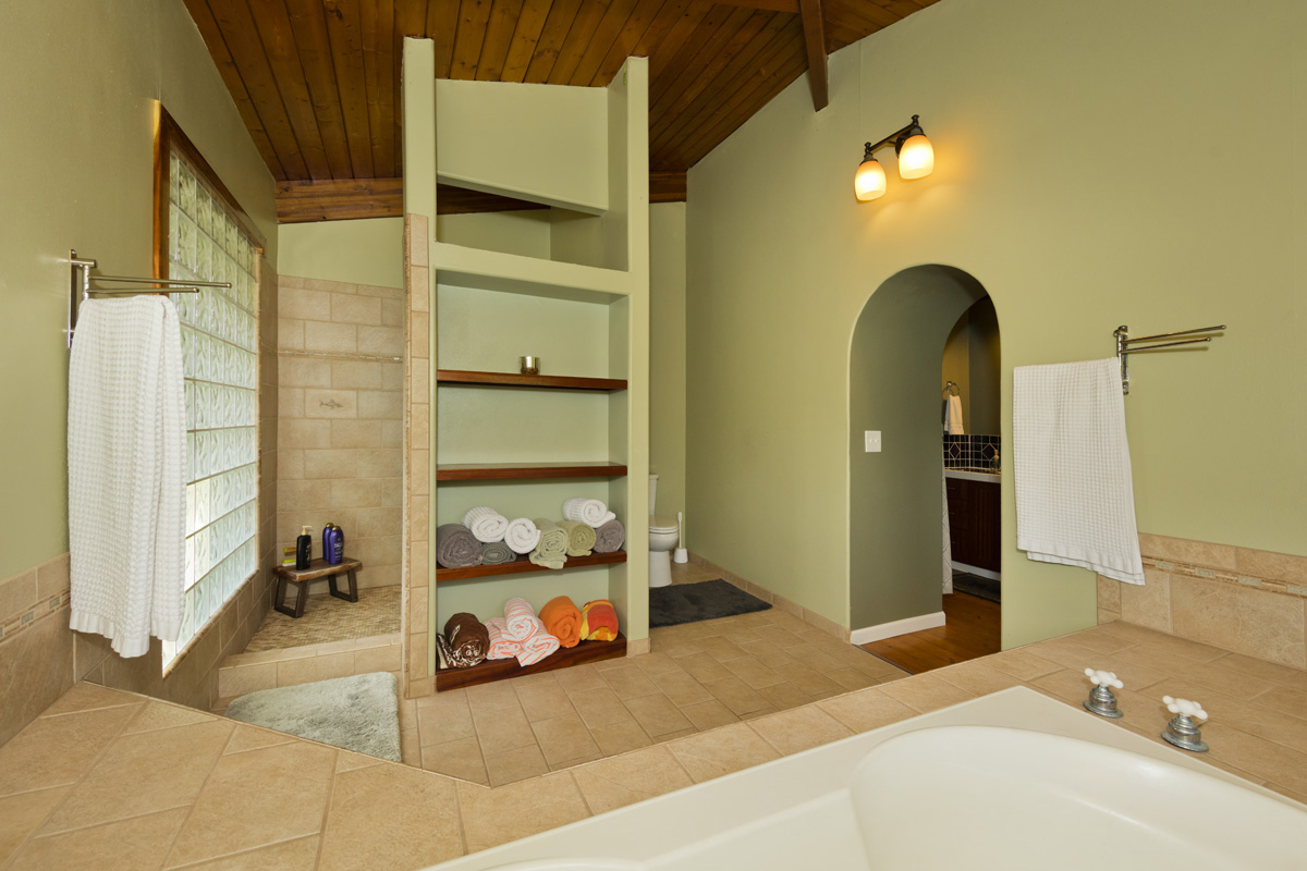 15-2817 Papai Street Pahoa, HI 96778 - Photo 21 of 30 a bedroom with a bed and a window