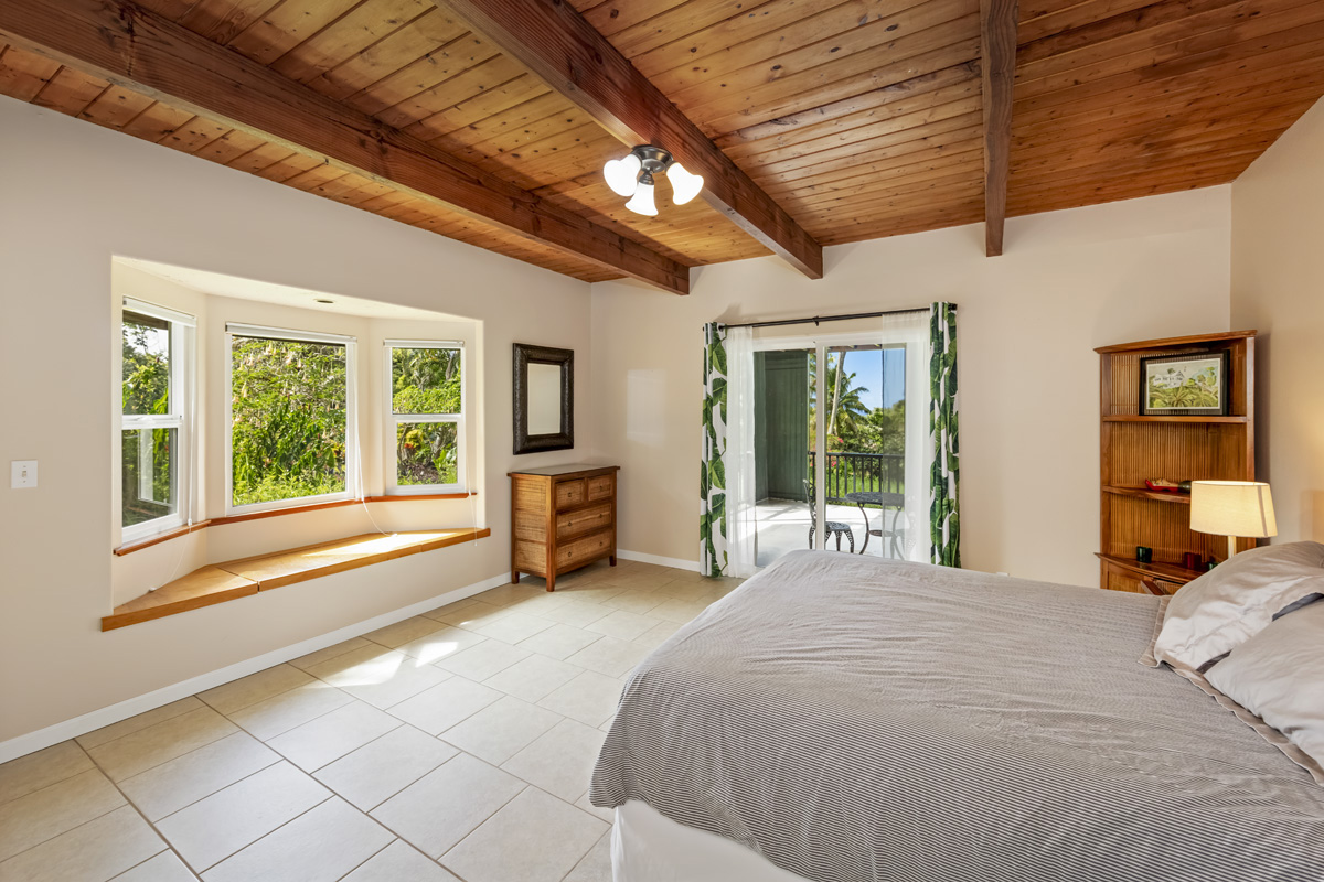 15-2817 Papai Street Pahoa, HI 96778 - Photo 25 of 30 a bedroom with furniture and large windows