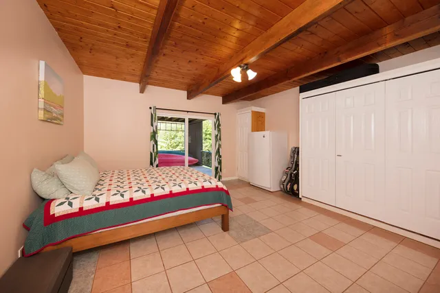 a large room with wooden furniture and a table