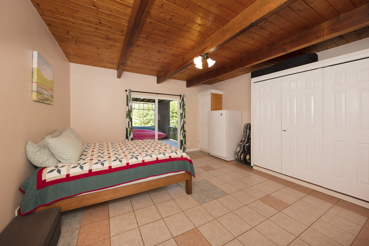 15-2817 Papai Street Pahoa, HI 96778 - Photo 26 of 30 a bedroom with bed and window