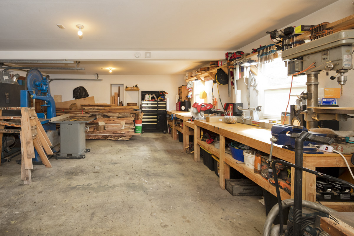 15-2817 Papai Street Pahoa, HI 96778 - Photo 28 of 30 a large room with wooden furniture and a table