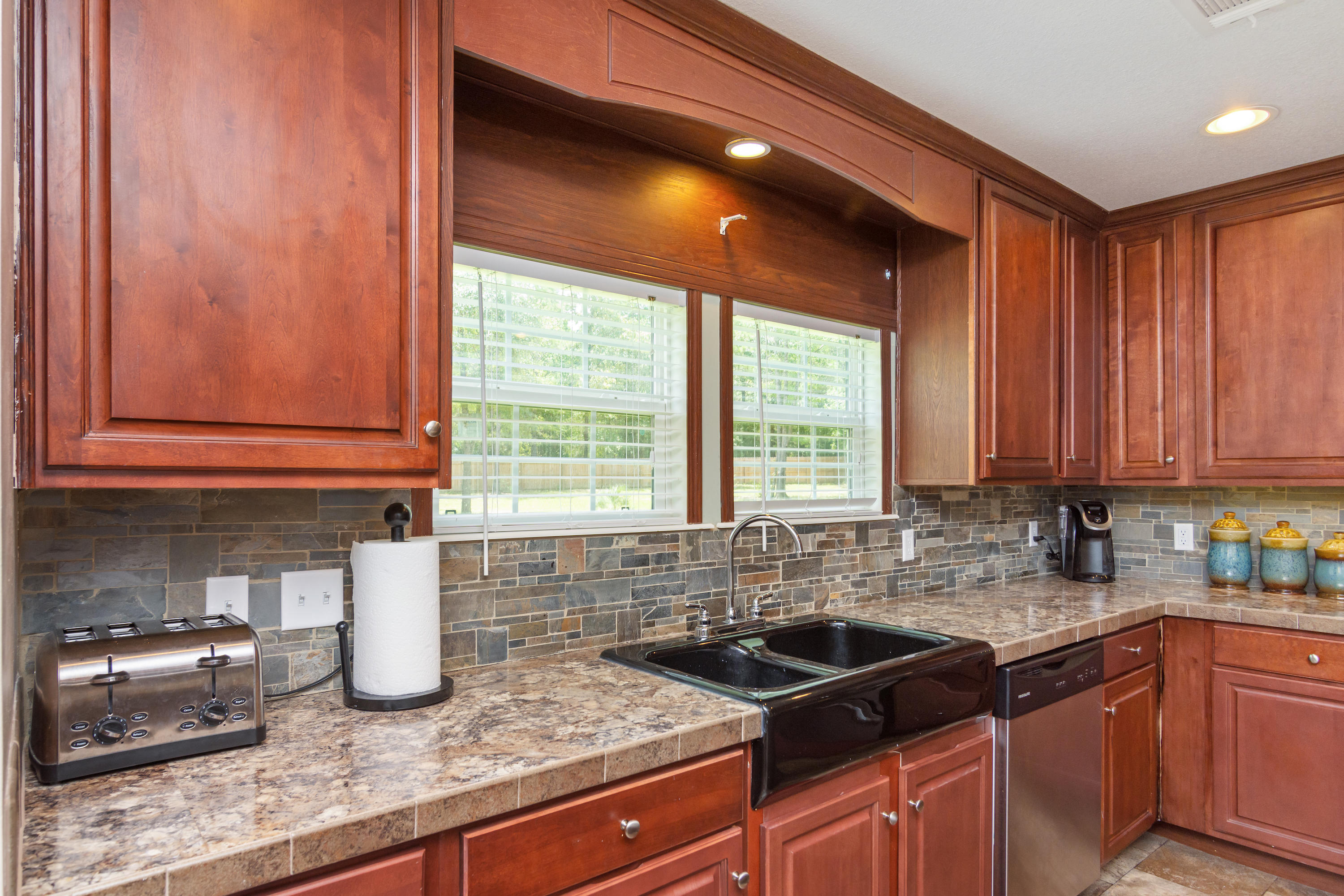 2185 Curtis Madden Road Baker, FL 32531 - Photo 12 of 41 a kitchen with granite countertop a sink and a window