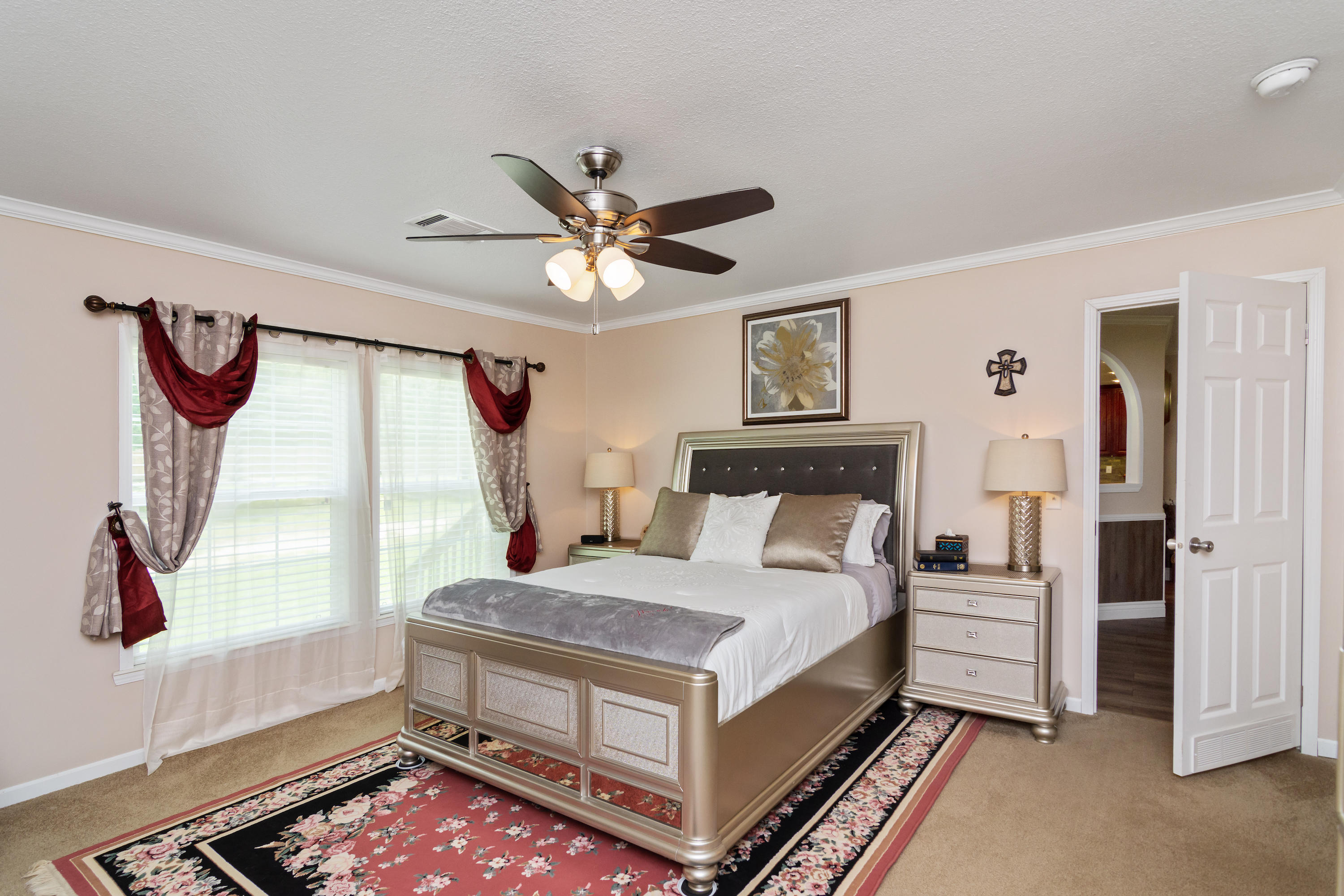 2185 Curtis Madden Road Baker, FL 32531 - Photo 15 of 41 a bedroom with a bed and a window