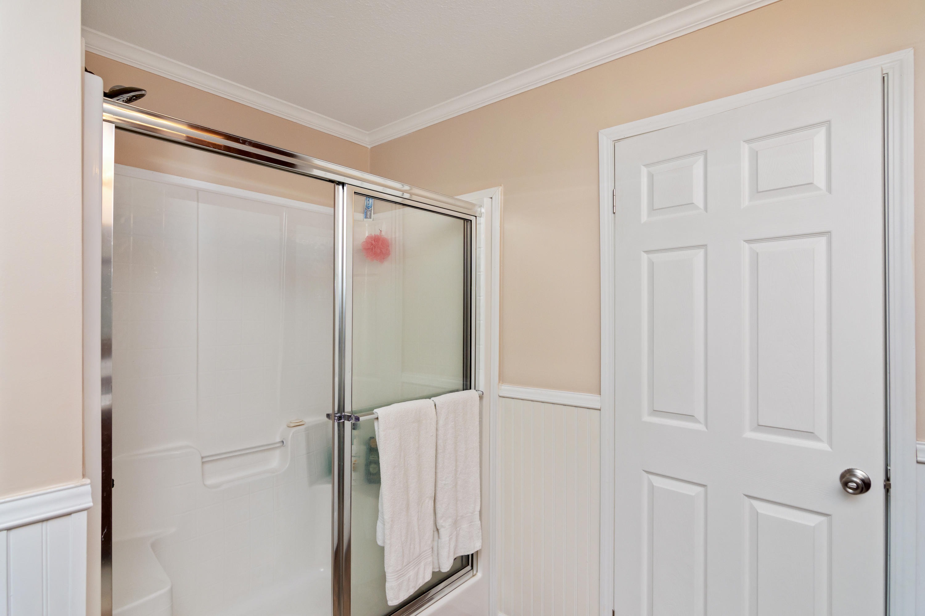 2185 Curtis Madden Road Baker, FL 32531 - Photo 20 of 41 a bathroom with a shower and a glass door