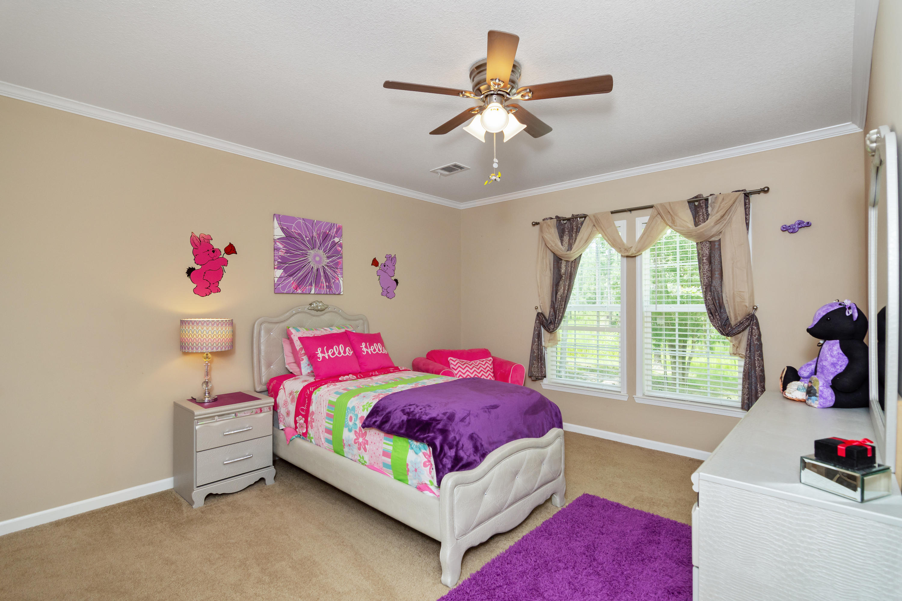 2185 Curtis Madden Road Baker, FL 32531 - Photo 23 of 41 a bedroom with a bed and a window