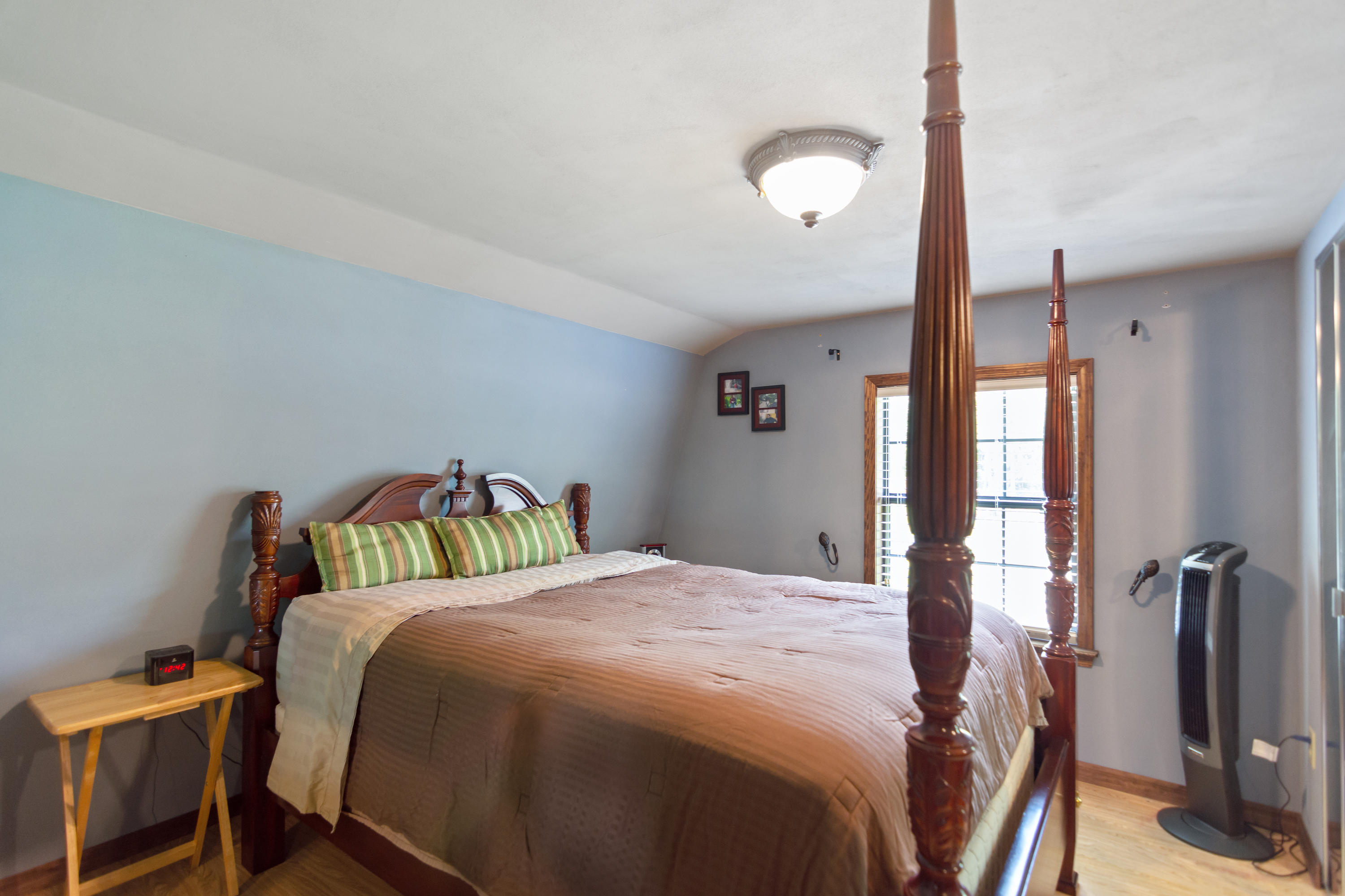 2185 Curtis Madden Road Baker, FL 32531 - Photo 33 of 41 a bedroom with a bed and a window