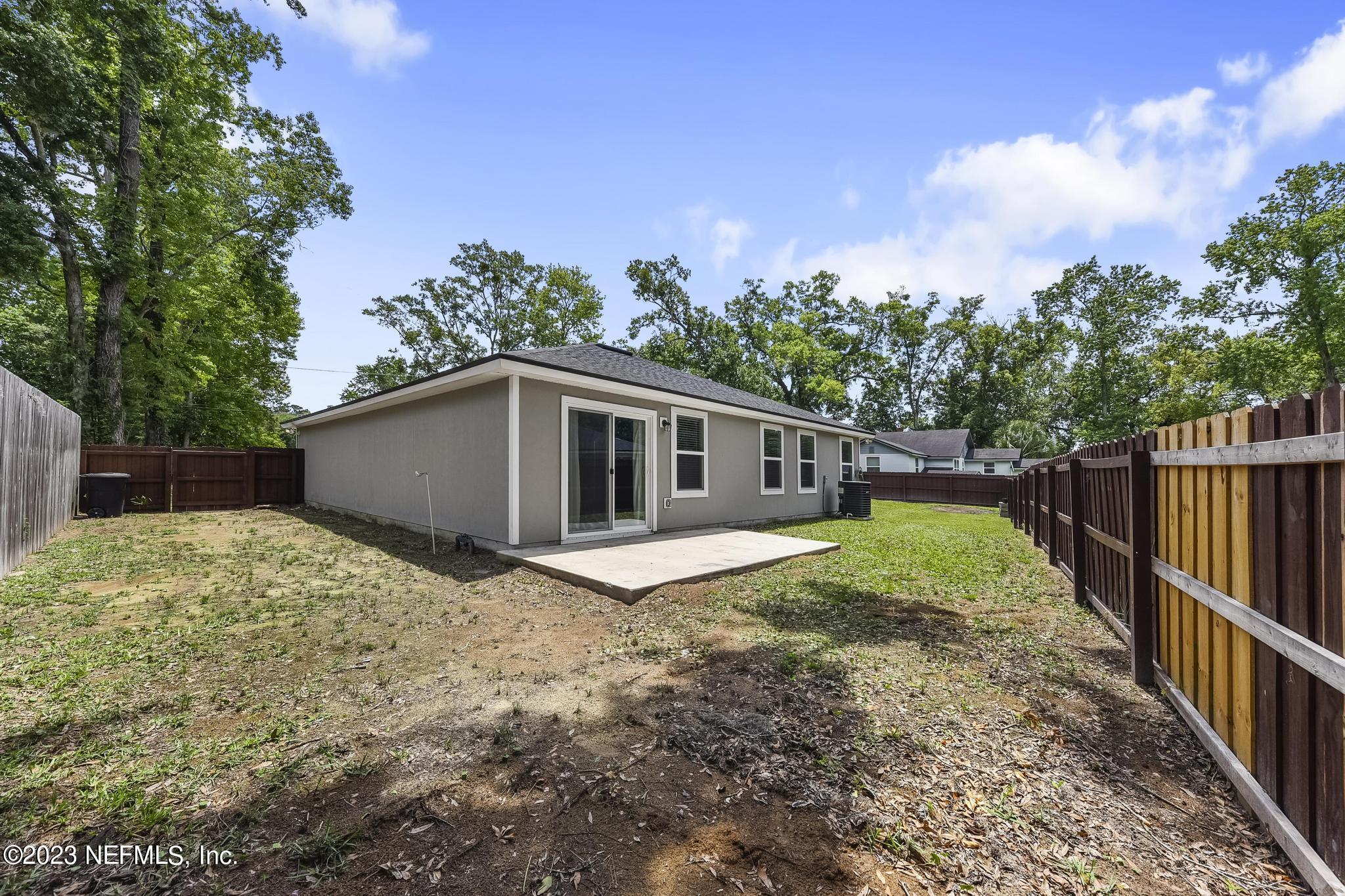 4118 Spring Park Circle Jacksonville, FL 32207 - Photo 21 of 21 a house with trees in the background