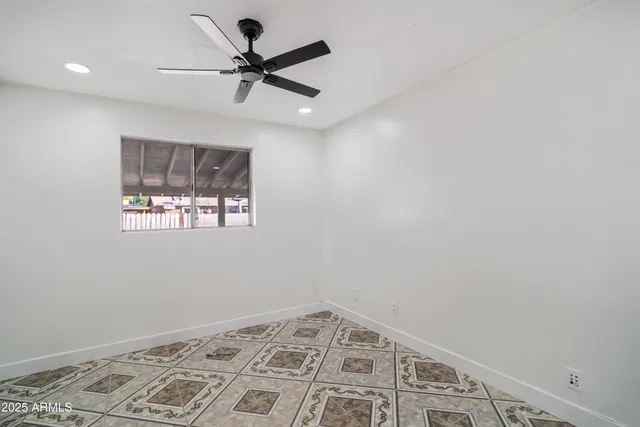 a view of a hallway with a window