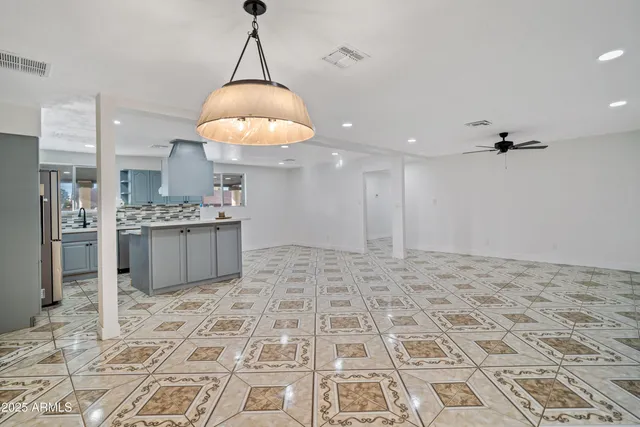a bathroom with a sink a mirror and a shower