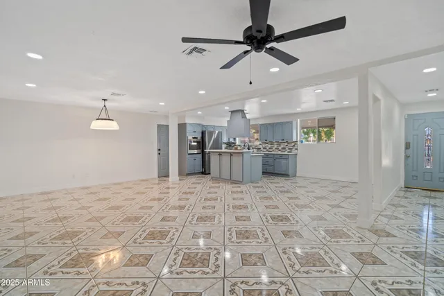 a view of a kitchen with a stove cabinets and a wooden floor
