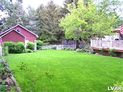 470 Cherry Hill Road Nazareth, PA 18064 - Photo 9 of 49 a view of a house with a yard and sitting area
