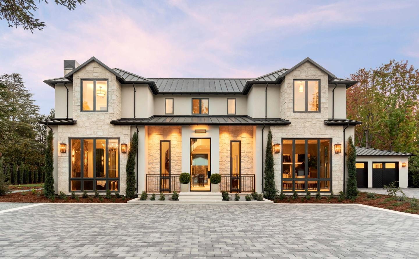 60 Shearer Drive Atherton, CA 94027 - Photo 2 of 39 a view of a brick house with large windows and a street