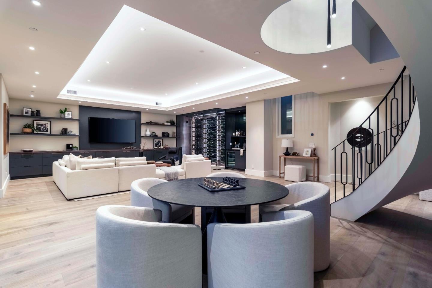 60 Shearer Drive Atherton, CA 94027 - Photo 22 of 39 a dining room with furniture a floor to ceiling window and kitchen view