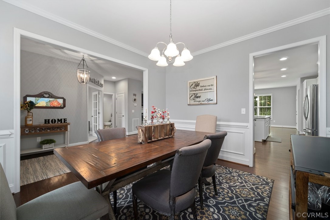 1330 Miners Trail Road Midlothian, VA 23114 - Photo 19 of 49 a view of a dining room with furniture and wooden floor