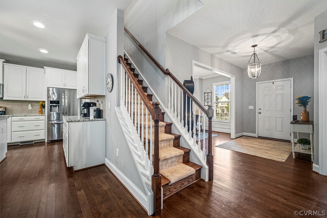 1330 Miners Trail Road Midlothian, VA 23114 - Photo 26 of 49 a view of entryway and kitchen with wooden floor