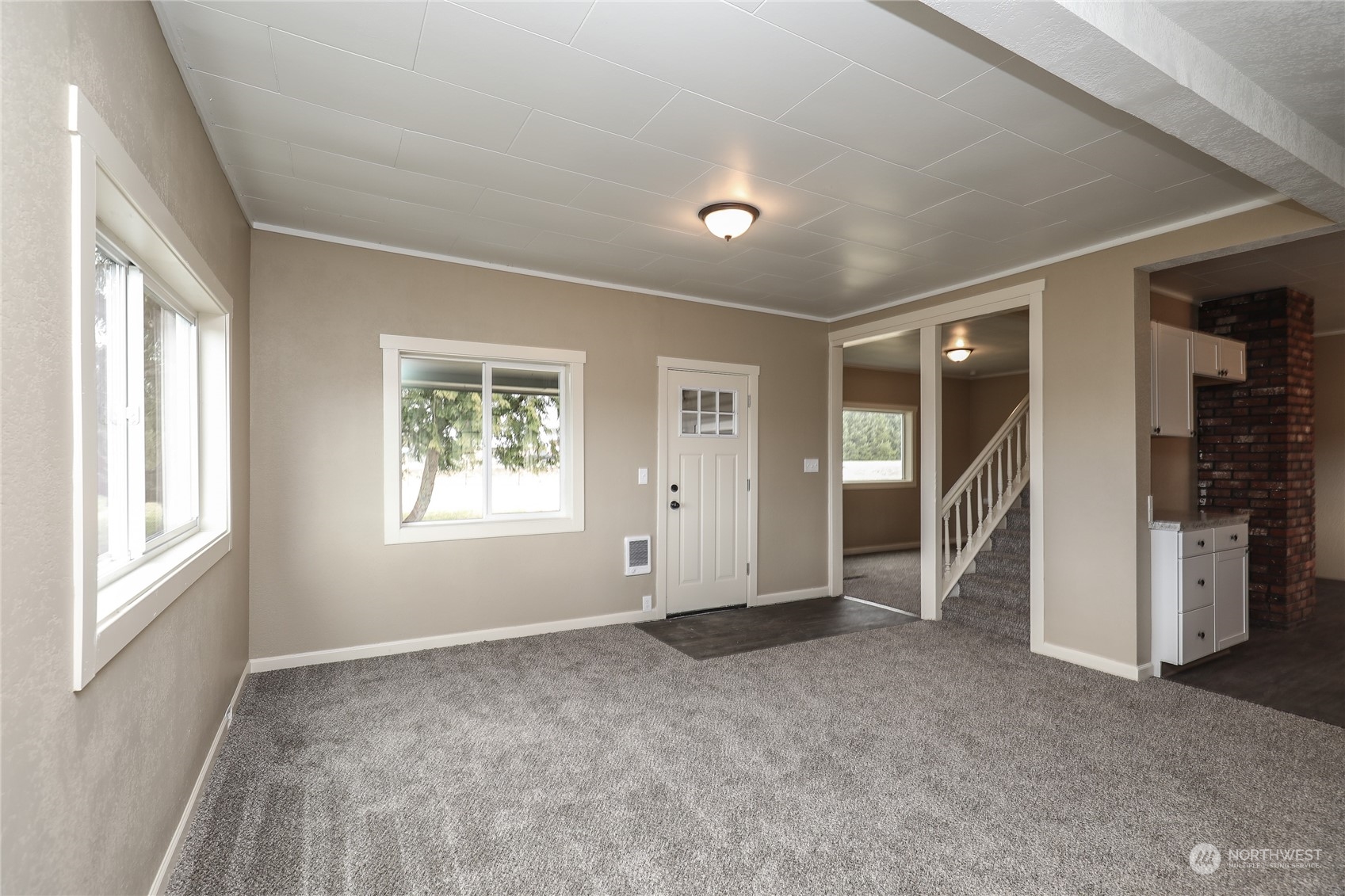 804 Highway 508 Chehalis, WA 98532 - Photo 2 of 17 a view of empty room with windows