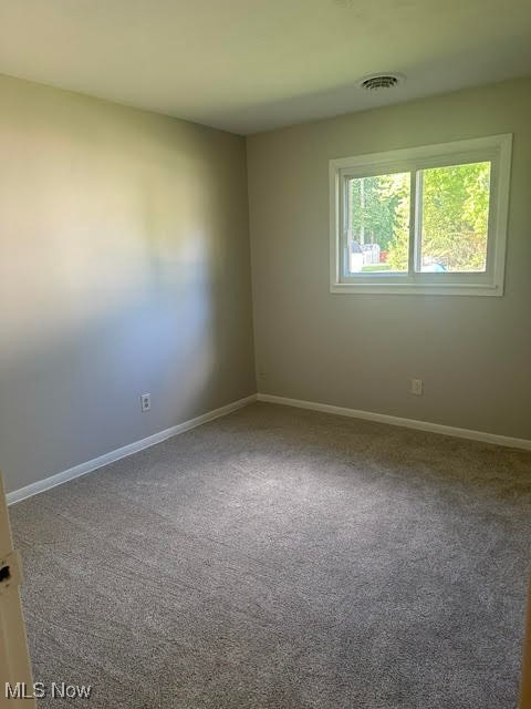 8136 Bellflower Road Mentor, OH 44060 - Photo 10 of 17 Empty room with light carpet and baseboards