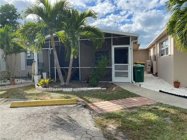 a view of a backyard with a patio