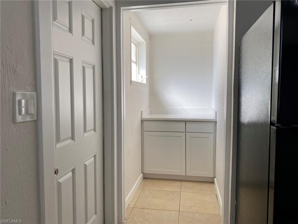 2084 Monroe Avenue Naples, FL 34112 - Photo 9 of 10 a view of a closet