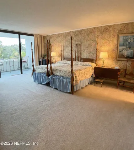 a room with pool table and a couch