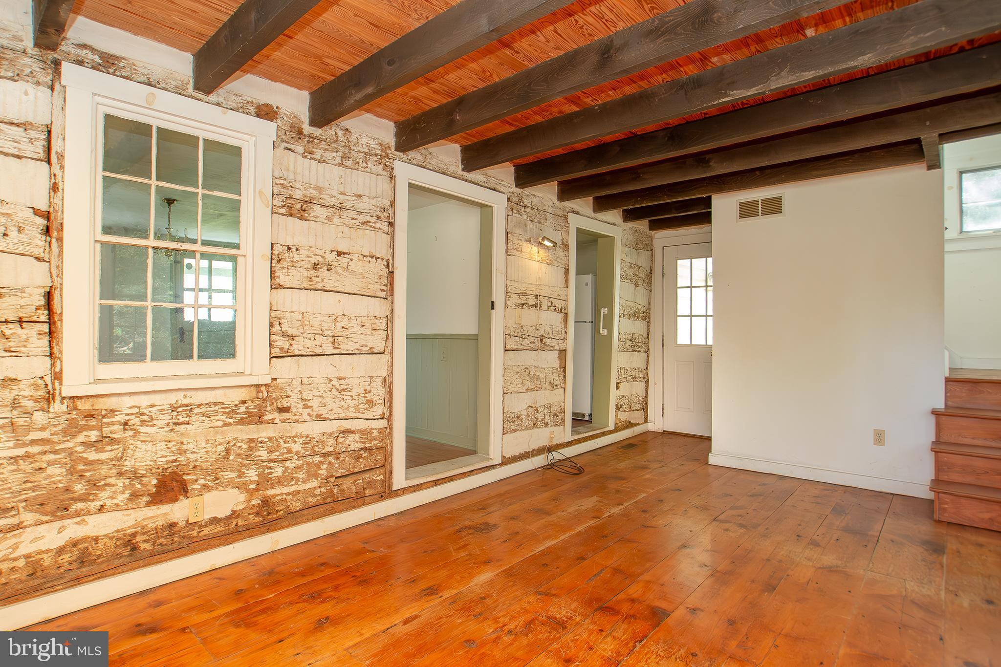 18663 Middletown Road Parkton, MD 21120 - Photo 6 of 72 Exposed Log in Living Room