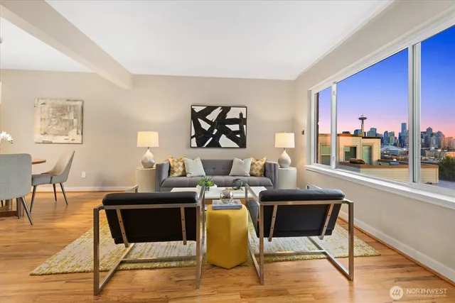 a dining room with furniture and wooden floor