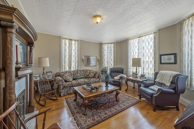 a living room with furniture and a window
