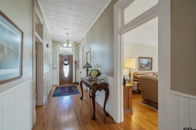 a very nice looking room with wooden floor