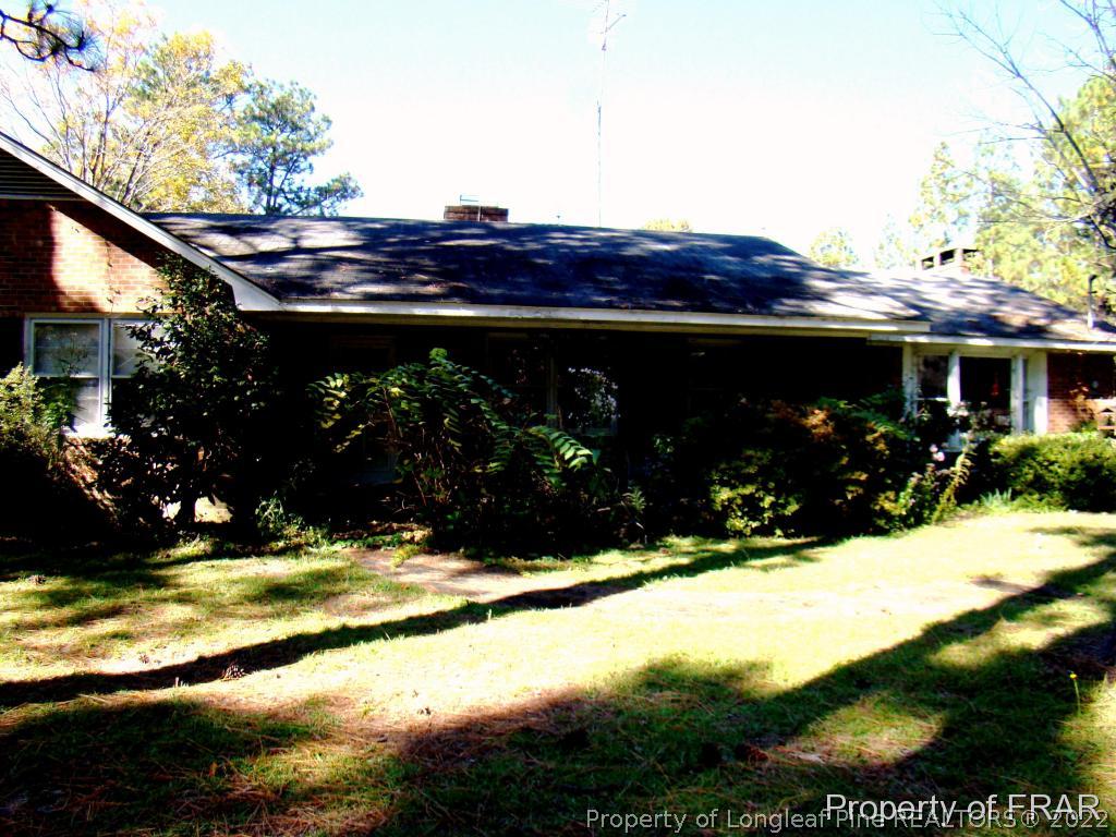 1615 Midland Road Southern Pines, NC 28387 - Photo 7 of 12 a view of outdoor space and yard