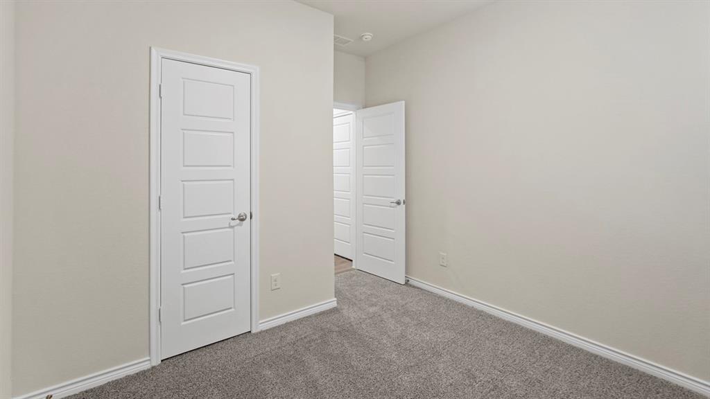 2424 Palo Pinto Trail Pilot Point, TX 76258 - Photo 12 of 39 an empty room with closet area